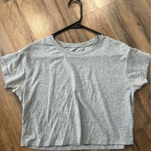 Lululemon Cates Tee in the color light gray